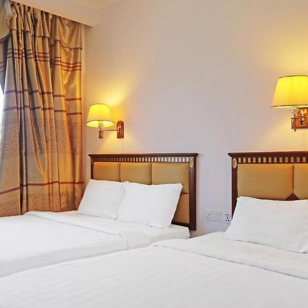 Super Oyo 90464 Borneo Suites Hotel Kota Kinabalu Eksteriør billede