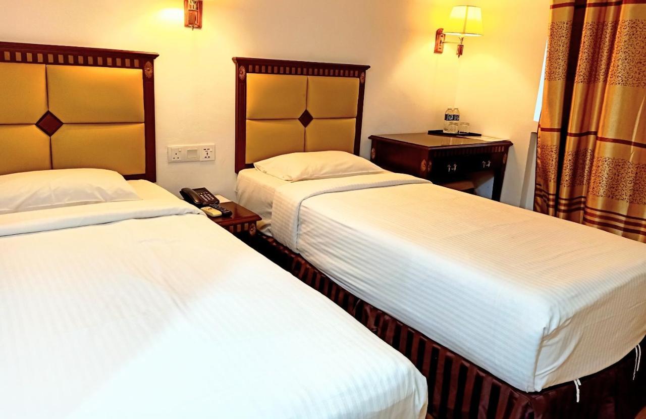 Super Oyo 90464 Borneo Suites Hotel Kota Kinabalu Eksteriør billede