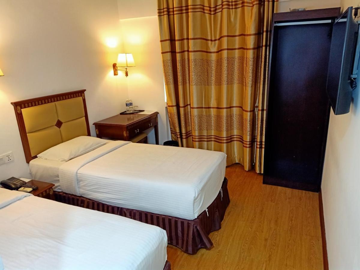 Super Oyo 90464 Borneo Suites Hotel Kota Kinabalu Eksteriør billede