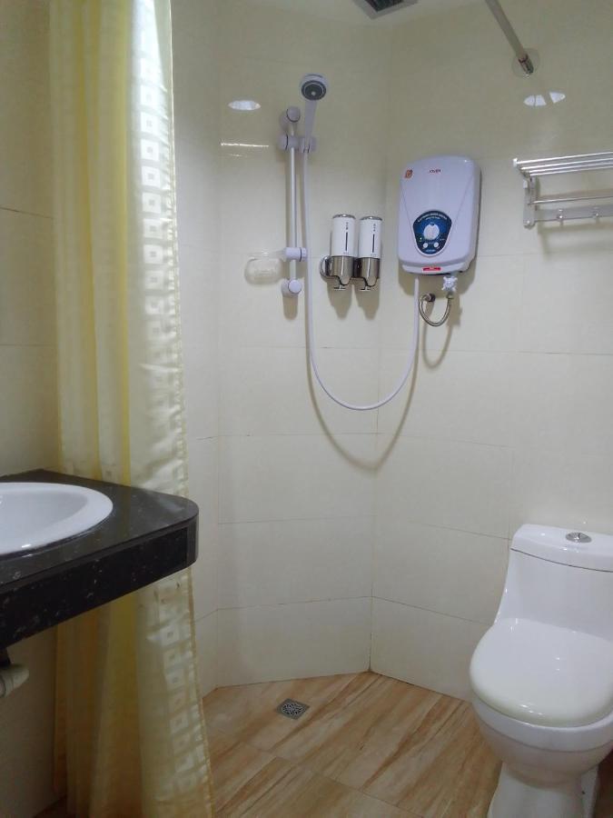 Super Oyo 90464 Borneo Suites Hotel Kota Kinabalu Eksteriør billede
