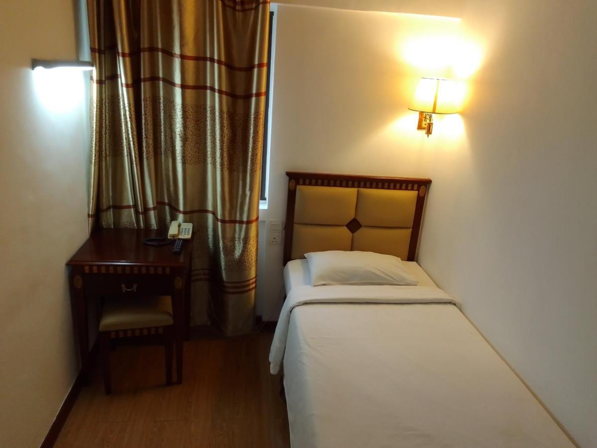 Super Oyo 90464 Borneo Suites Hotel Kota Kinabalu Eksteriør billede