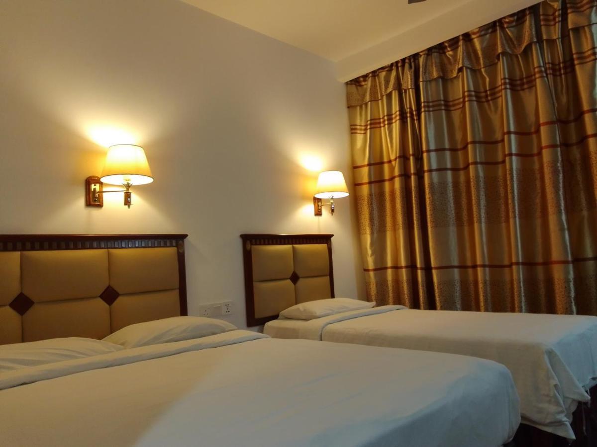 Super Oyo 90464 Borneo Suites Hotel Kota Kinabalu Eksteriør billede