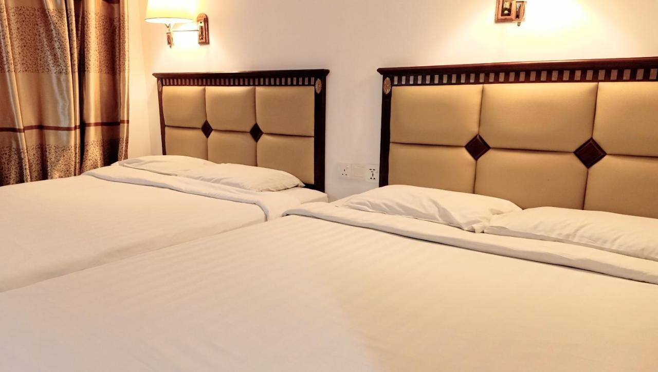 Super Oyo 90464 Borneo Suites Hotel Kota Kinabalu Eksteriør billede