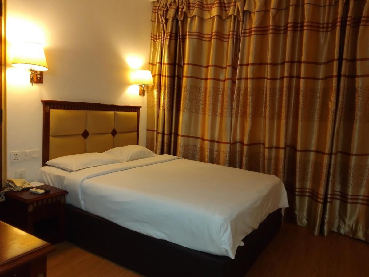 Super Oyo 90464 Borneo Suites Hotel Kota Kinabalu Eksteriør billede