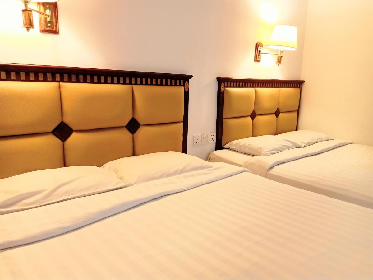 Super Oyo 90464 Borneo Suites Hotel Kota Kinabalu Eksteriør billede
